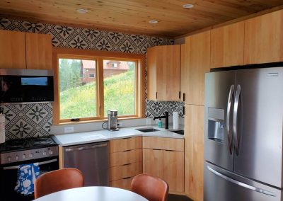 Oiled Maple Kitchen Cabinets Apartment Sink Area